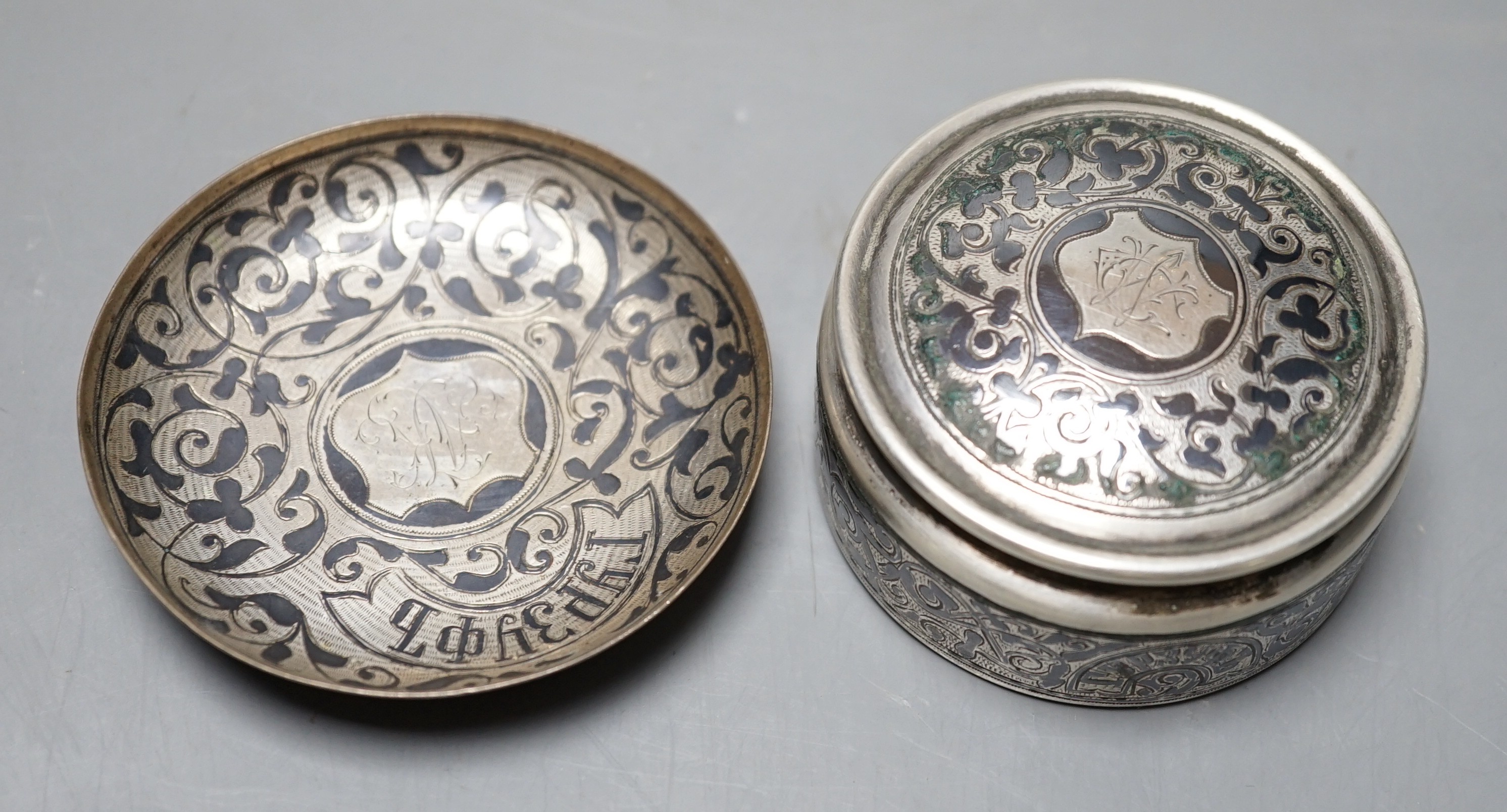 A late 19th/early 20th century Russian 84 zolotnik and niello part communion? set, comprising a pot and cover with dish, 73mm.